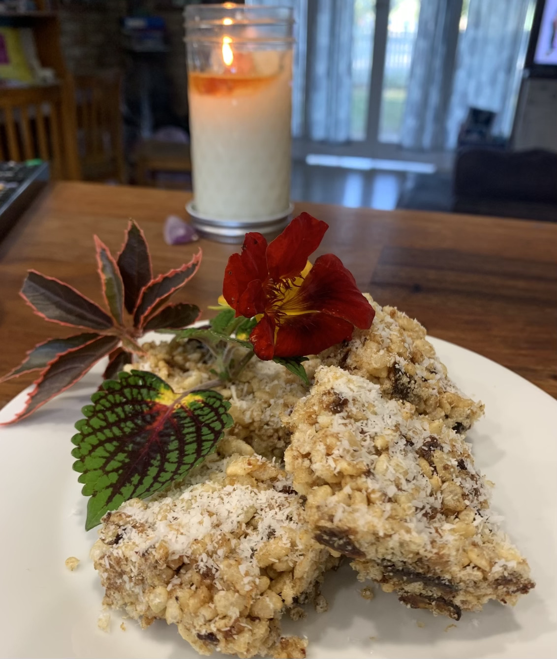 photo of date wafers, flowers, candle